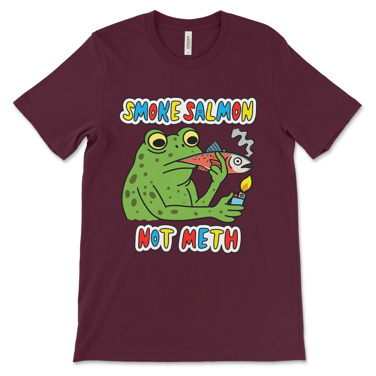 Absurd graphic tee with a frog smoking a whole salmon. Designed for lovers of dark humor t-shirts, cursed memes, and strange fashion statements.