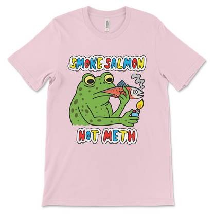 Unhinged t-shirt featuring a frog smoking a salmon instead of a cigarette. Made for people who love surreal graphic tees and bizarre meme apparel.
