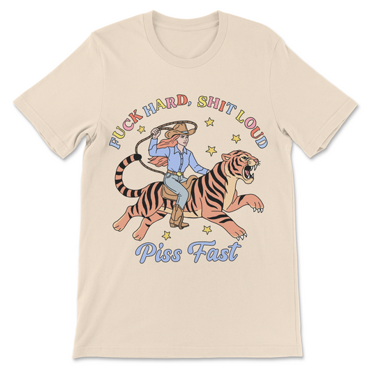 Fuck Hard Shit Loud Piss Fast shirt featuring a cowgirl riding a tiger