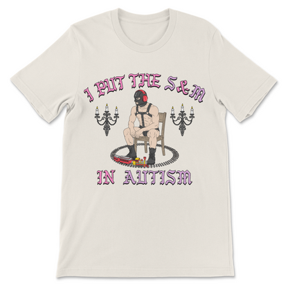 Autism t-shirt with I Put The S and M In Autism slogan combining autistic stereotypes with dark humor.

