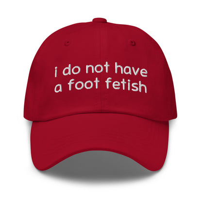 Foot Fetish dad hat, embroidered offensive slogan cap, funny gross-out meme hat, ironic humor hat, inappropriate embroidered hat, dark humor headwear, offensive fashion accessory.