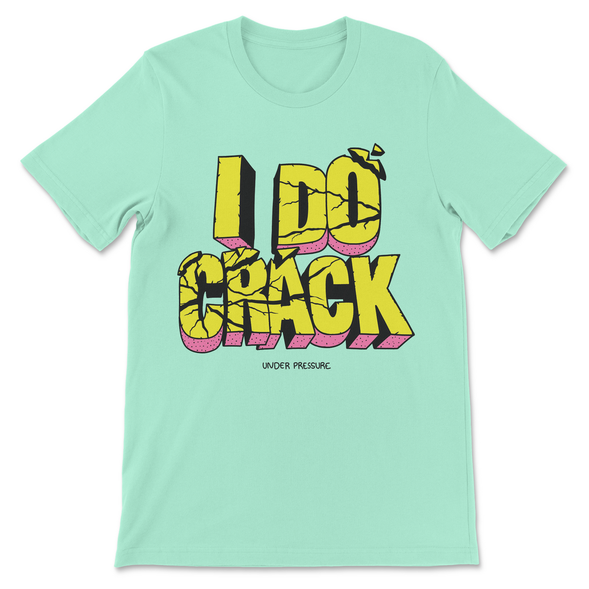 A mint green short-sleeve t-shirt with a bold graphic on the front reading 'I DO CRACK' in yellow 3D letters with pink shadows, and smaller text 'UNDER PRESSURE' below.