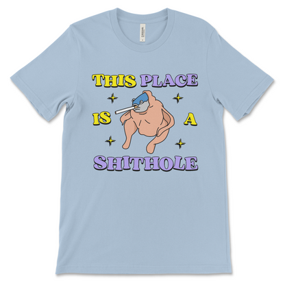 This surreal This Place Is a Shithole shirt political satire anti-USA graphic tee, is an offensive dark humor t-shirt, anti-establishment joke and inappropriate novelty shirt.