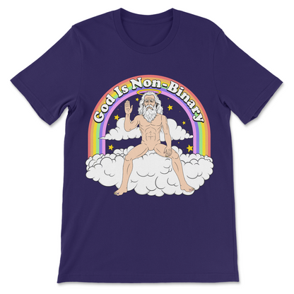 A purple short-sleeve t-shirt with a graphic print of a bearded God-like figure sitting on clouds under a rainbow, with the text 'God Is Non-Binary' arched above.