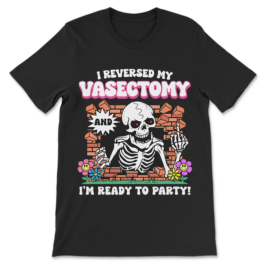 Front view of black I Reversed My Vasectomy and I'm Ready to Party shirt featuring a skeleton bursting through a brick wall and giving the middle finger.