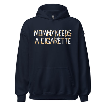 A navy blue pullover hoodie with a front kangaroo pocket and a graphic text print reading 'MOMMY NEEDS A CIGARETTE' in white and orange-yellow lettering, shown on a plain white background.