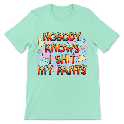 Colorful 80s inspired graphic tee featuring the phrase "Nobody Knows I Shit My Pants" for lovers of immature humor.
