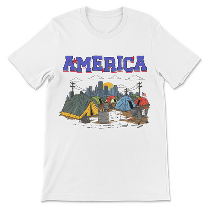 Dark humor America shirt featuring a fictional tent city, urban skyline, and ironic red, white, and blue typography.

