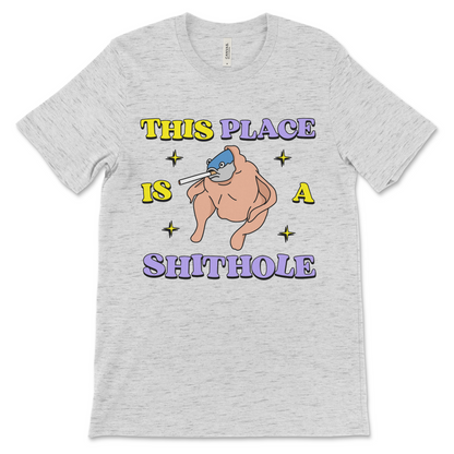 Bizarre graphic shirt with unhinged slogan and political satire. Ideal for those searching for anti Trump humor and absurd fashion.